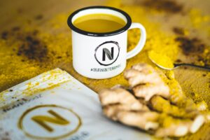 Cup of turmeric and ginger tea as a natural anti-inflammatory remedy for rheumatoid arthritis pain